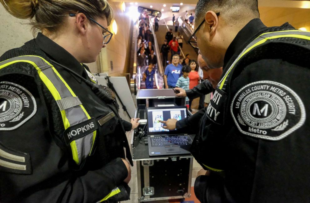 Los Angeles County Metropolitan Transportation Authority (Metro) police officers working with the TSA-vetted and approved Thruvision portable, advanced passenger screening technology, August 14, 2018 in Los Angeles.