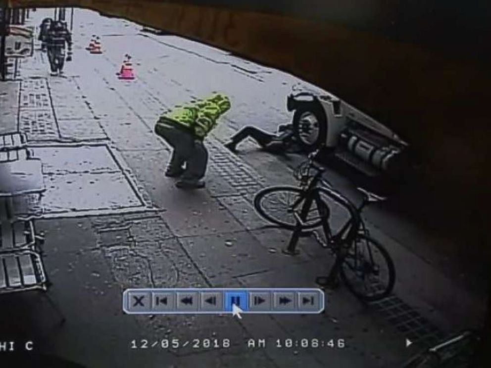 PHOTO: Surveillance video shows a man pushing a random passerby in front of a truck in downtown Los Angeles on Wednesday, Dec. 5, 2018.