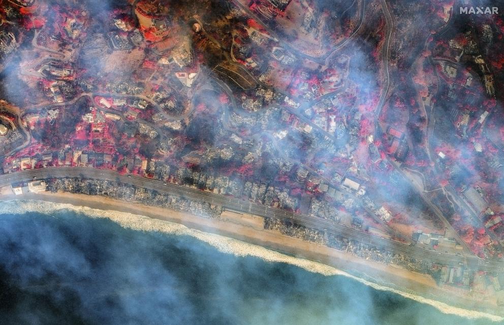 PHOTO: Overview of beachfront homes after fire swept along La Costa Beach, in Malibu, Calif., in a satellite image provided by MaxarTechnologies.