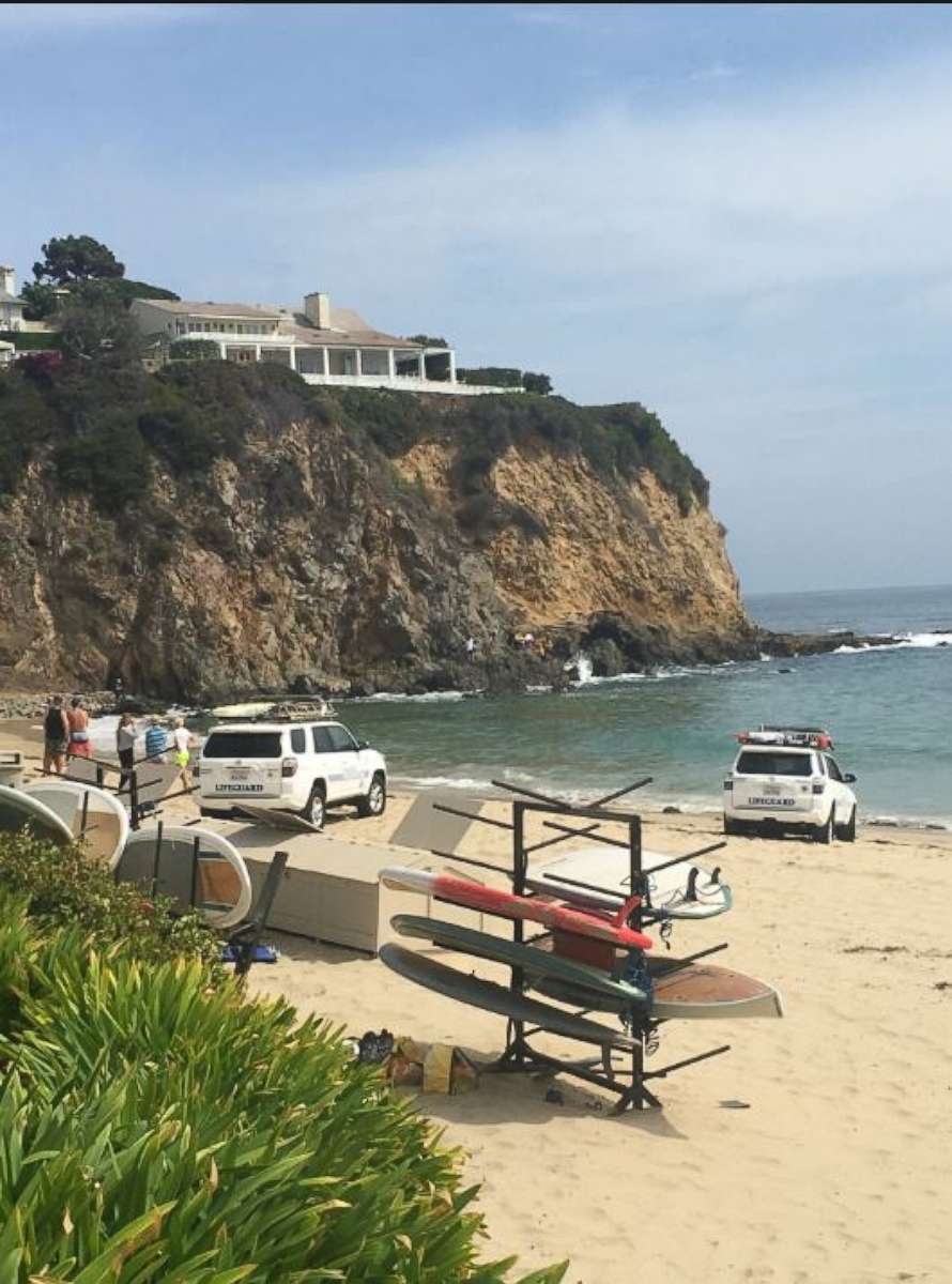 PHOTO: Rescue at EBay under way for juvie that has arm trapped under a rock, Laguna Beach California, July 18, 2018.