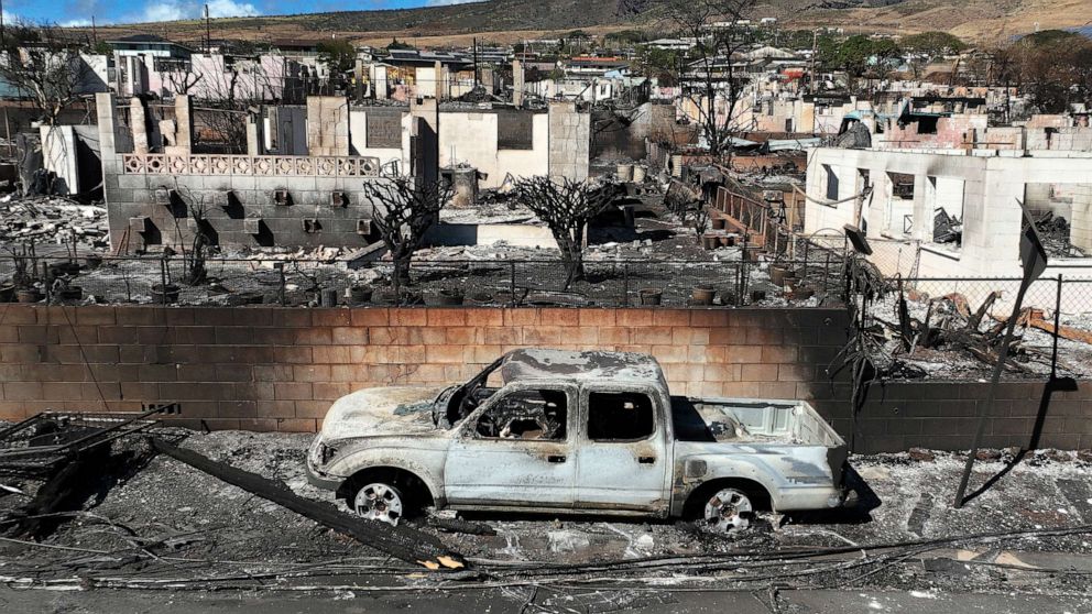 PHOTO: Burned cars and homes are seen a neighborhood that was destroyed by a wildfire on Aug. 17, 2023, in Lahaina, Hawaii.