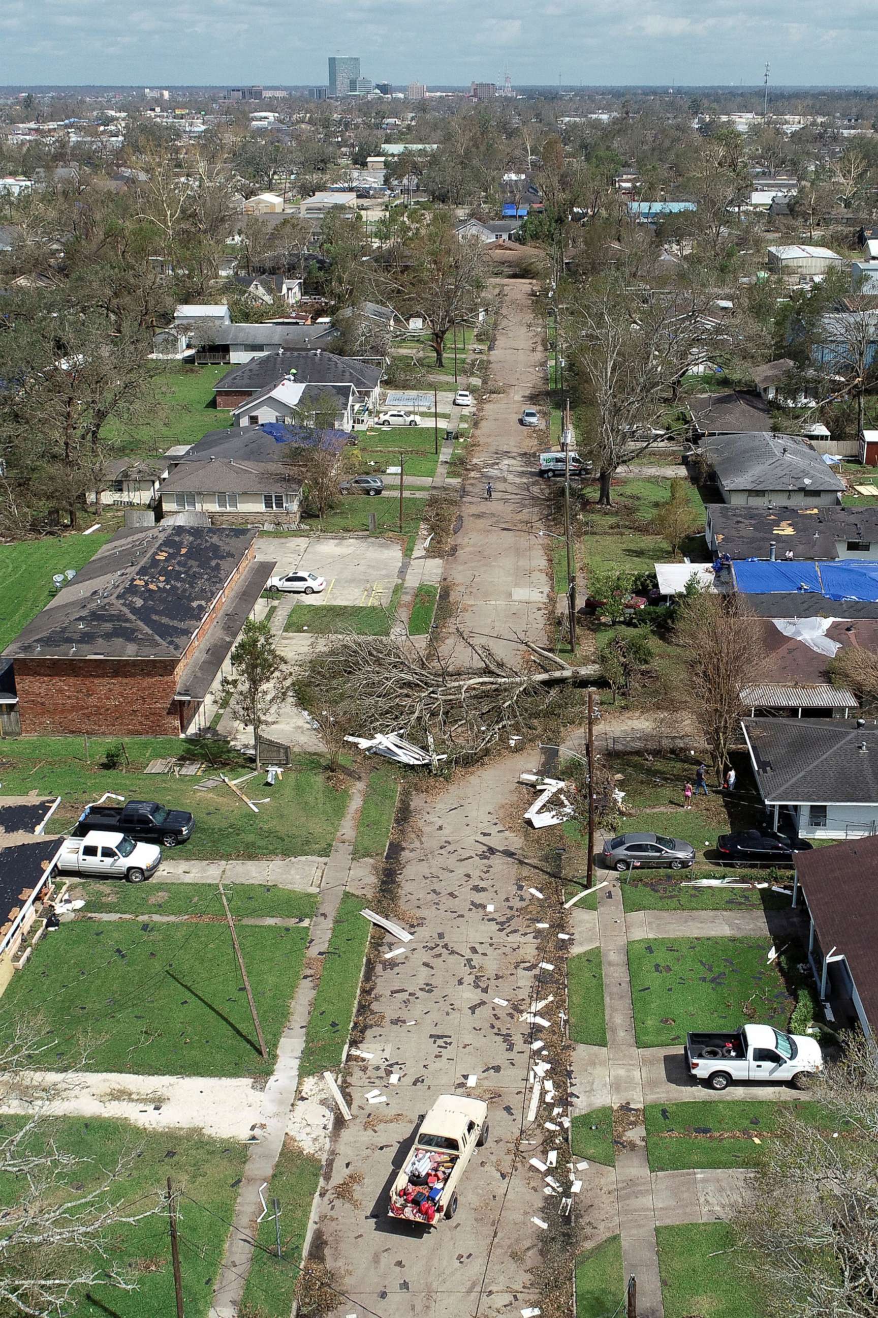 PHOTO: A tree knocked over by Hurricane Laura blocks a residential street in an aerial photograph in Lake Charles, Aug. 30, 2020.