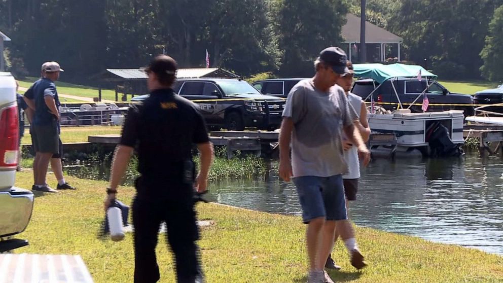 PHOTO: Police and boat rescue teams work at Lake Jordan in Alabama after reports that two people went missing after a boat crash late on July 4, 2019.