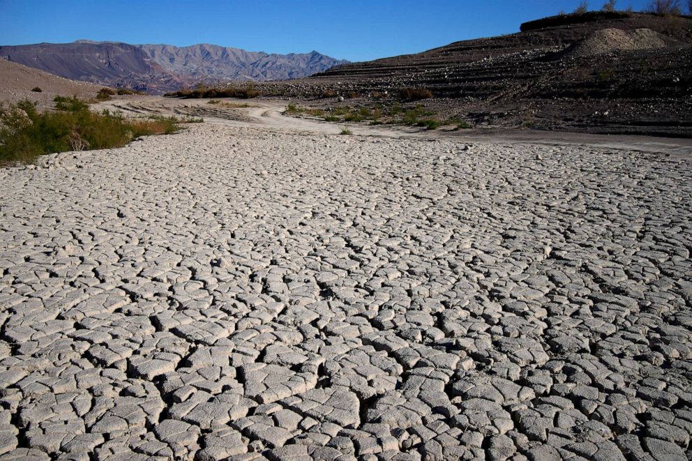 PHOTO: Cracked earth is visible in an area once under the water of Lake Mead at the Lake Mead National Recreation Area, on Jan. 27, 2023, near Boulder City, Nev.