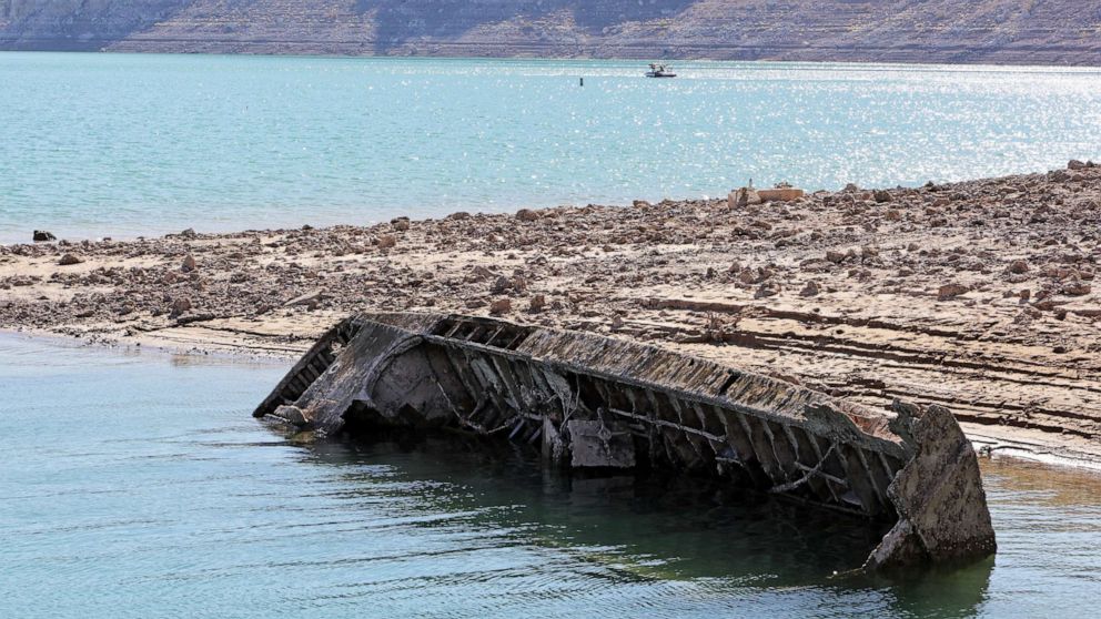 PHOTO: A sunken World War II-Era Higgins landing craft that used to be nearly 200 feet underwater is being revealed near the Lake Mead Marina as the waterline continues to lower in the Lake Mead National Recreation Area, Nev., July 1, 2022. 