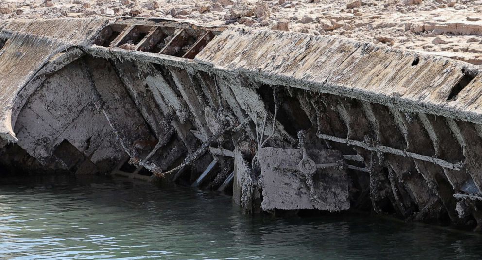 PHOTO: A sunken World War II-Era Higgins landing craft that used to be nearly 200 feet underwater is being revealed near the Lake Mead Marina as the waterline continues to lower in the Lake Mead National Recreation Area, Nev., July 1, 2022. 