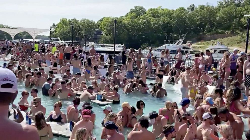 PHOTO: A crowded group of revelers celebrate Memorial Day weekend at Osage Beach of the Lake of the Ozarks, Missouri, May 23, 2020.