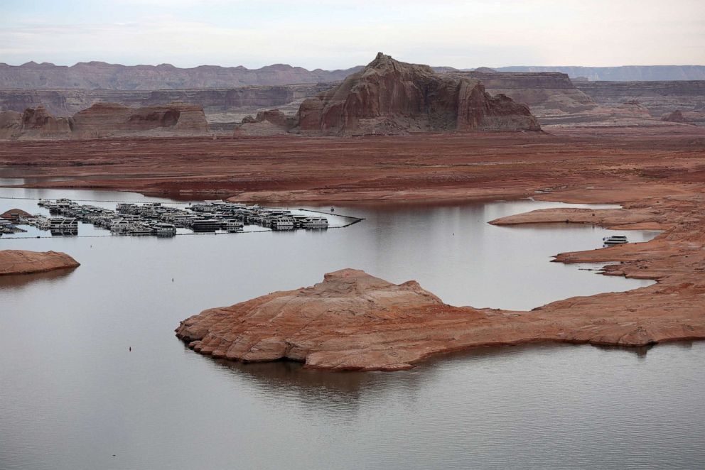 PHOTO: In this March 28, 2022, file photo, low water levels are visible at the Wahweap Marina at Lake Powell, in Page, Ariz.