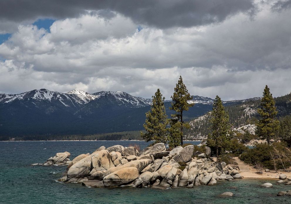 PHOTO: A blustery day with clouds moving across the lake brings the chance of rain and snow as viewed on April 14, 2021, in Sand Harbor, Nevada.