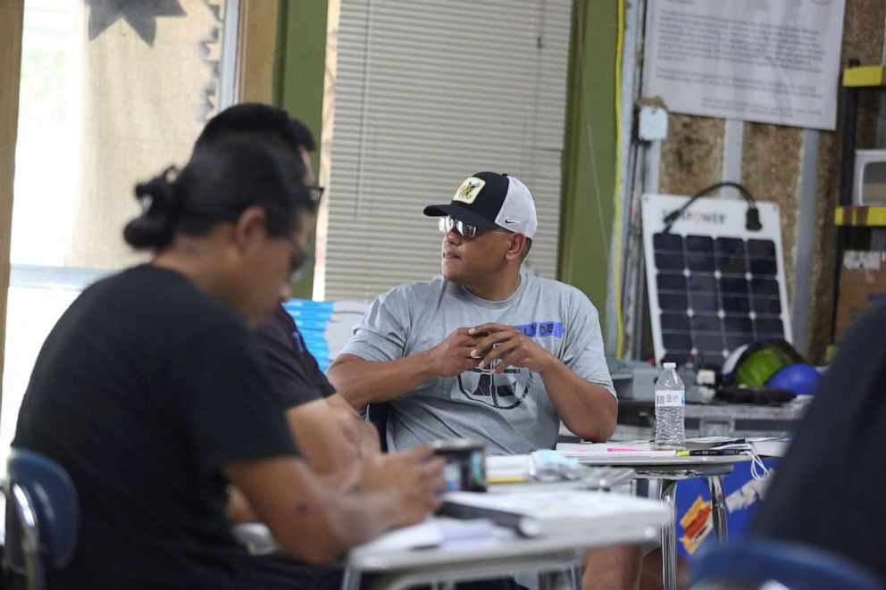 PHOTO: Clyde Brown (C) looks on during a class on the Pine Ridge reservation in South Dakota, June 13, 2021. 