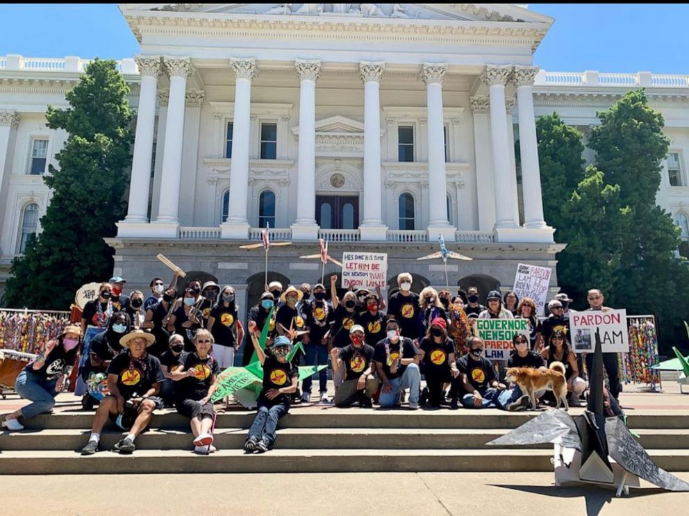 PHOTO: Participants pose for a photo a rally organized for Lam Le by Tsuru for Solidarity on June 4, 2021, in Sacramento, Calif.