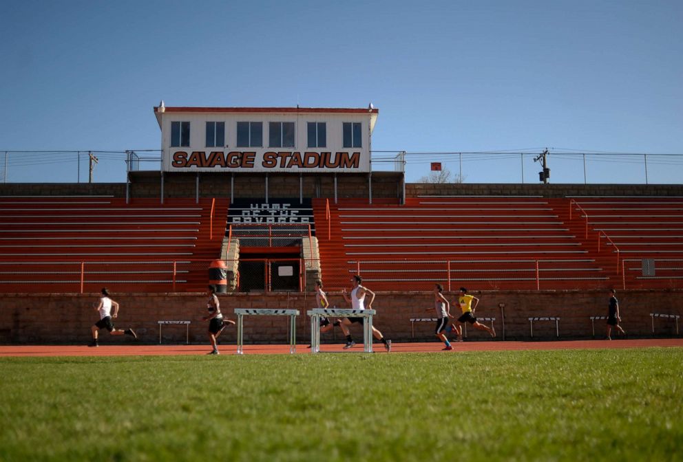 PHOTO: Students workout during track practice at Savage Stadium in Lamar, March 31, 2015.