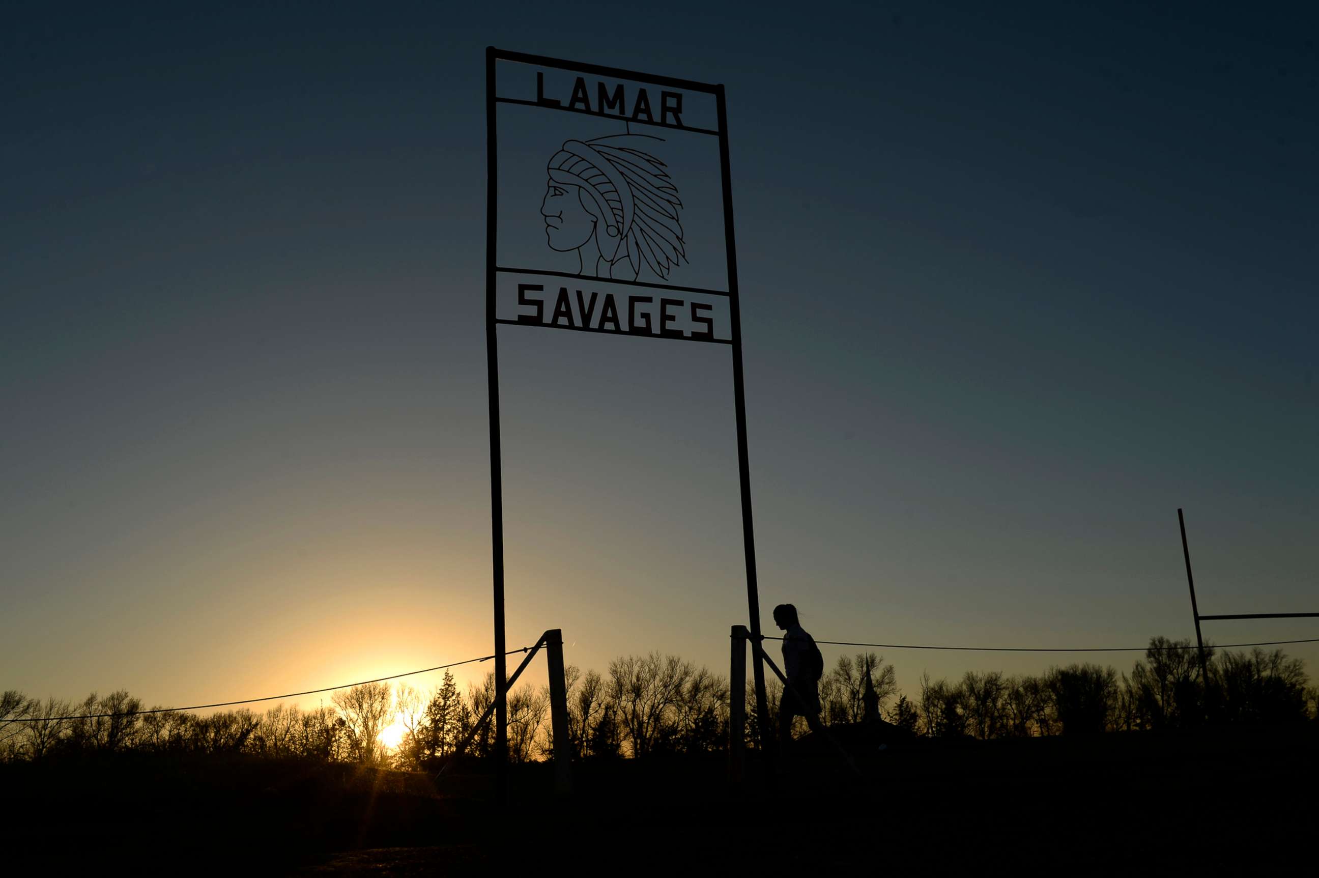 PHOTO: Alina Balasoiu, a junior  at Lamar High School, walks back to school after play in a soccer game in the fields behind the school, March 31, 2015. 