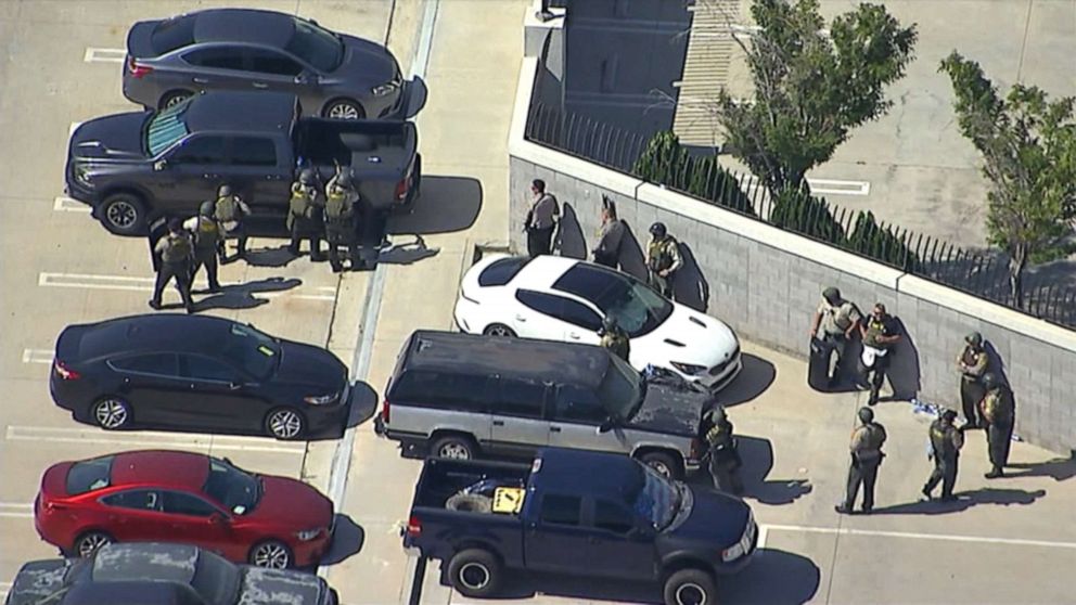 PHOTO: Police on the scene where a sheriff's deputy was shot heading to his car in a parking lot in Lancaster, Calif., Aug. 21, 2019.