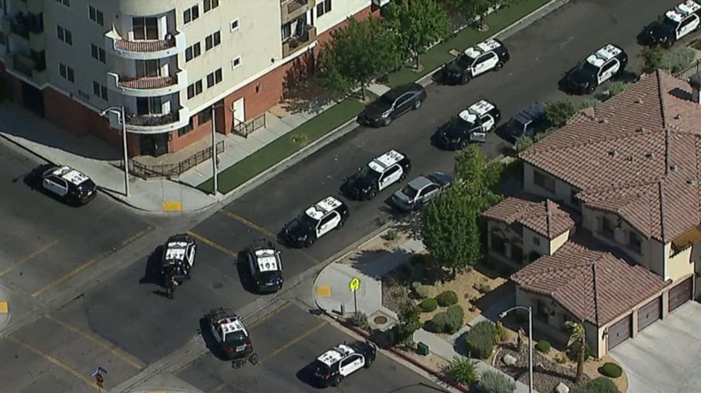 PHOTO: Police on the scene where a sheriff's deputy was shot heading to his car in a parking lot in Lancaster, Calif., Aug. 21, 2019.