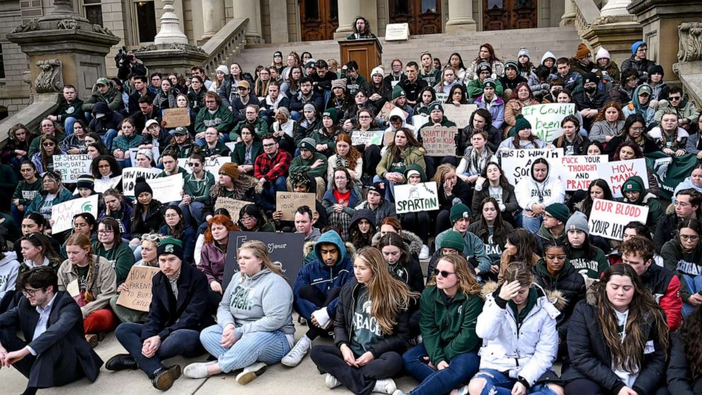PHOTO: Michigan State University students gather on the front steps of the Capitol, in Lansing, Mich., Feb. 15, 2023.