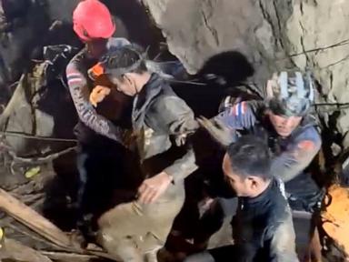 Villager rescued from Laos cave, divers go back for others trapped