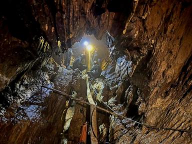 Laos cave rescue workers report 'knocking sound' in search for last 2 missing people
