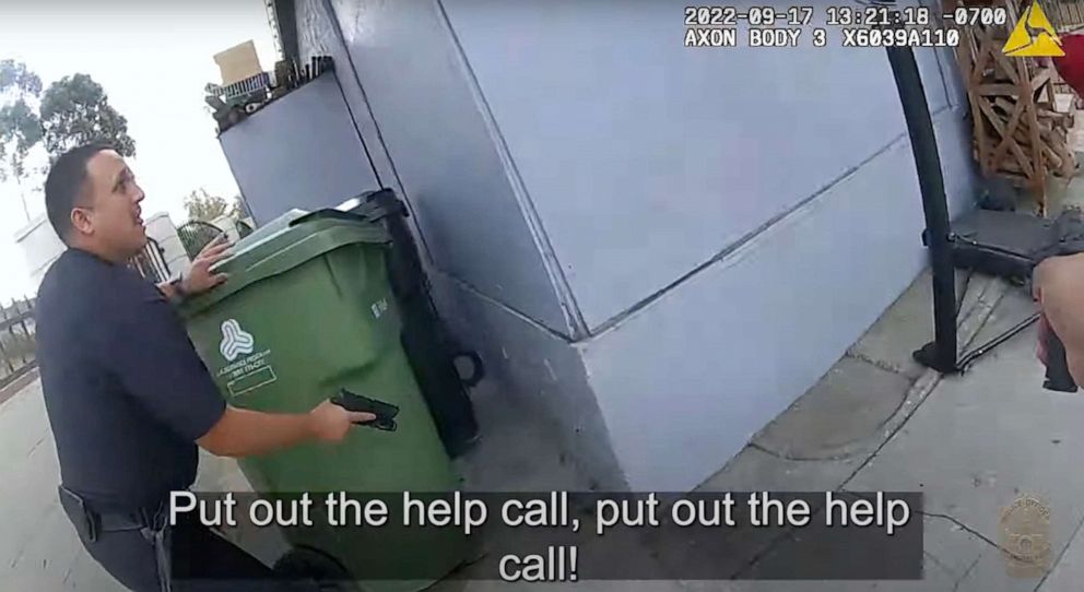 PHOTO: LAPD officers seen in a body-camera video taking cover on Sept. 17, 2022, and fatally shooting a man who emerged from the house wielding what appeared to be an assault rifle, but later was determined to be an airsoft rifle.
