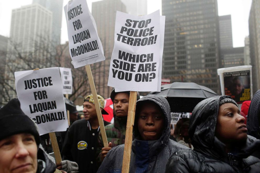 PHOTO: Demonstrators protest the shooting of Laquan McDonald along the Magnificent Mile, on Nov. 27, 2015 in Chicago.
