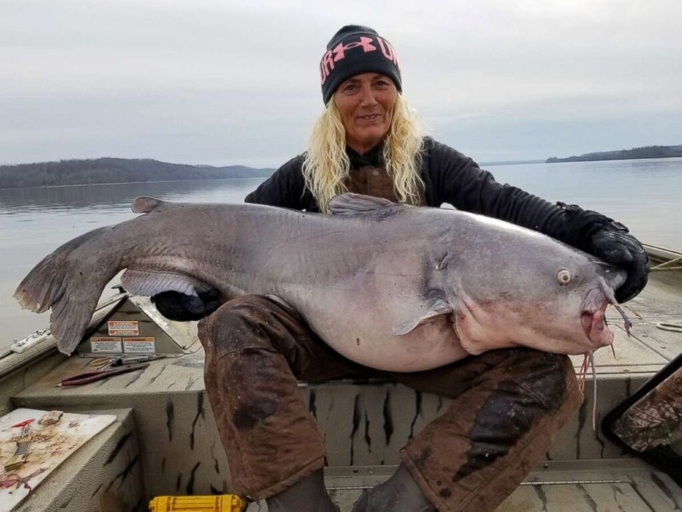 PHOTO: Paula Cathey Smith caught an 88-pound catfish in the Tennessee River, Dec. 30, 2018, before releasing it back in the water. 