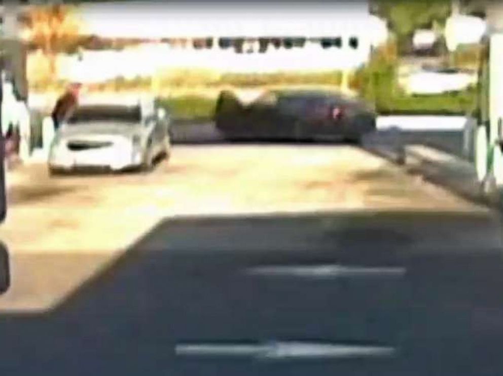 PHOTO: Surveillance footage released by Largo Police shows a black Nissan Altima moving in reverse through a Wawa gas station with its door ajar during an encounter that led to police shooting Linus Phillip Jr. in Clearwater, Fla., March 23, 2018.