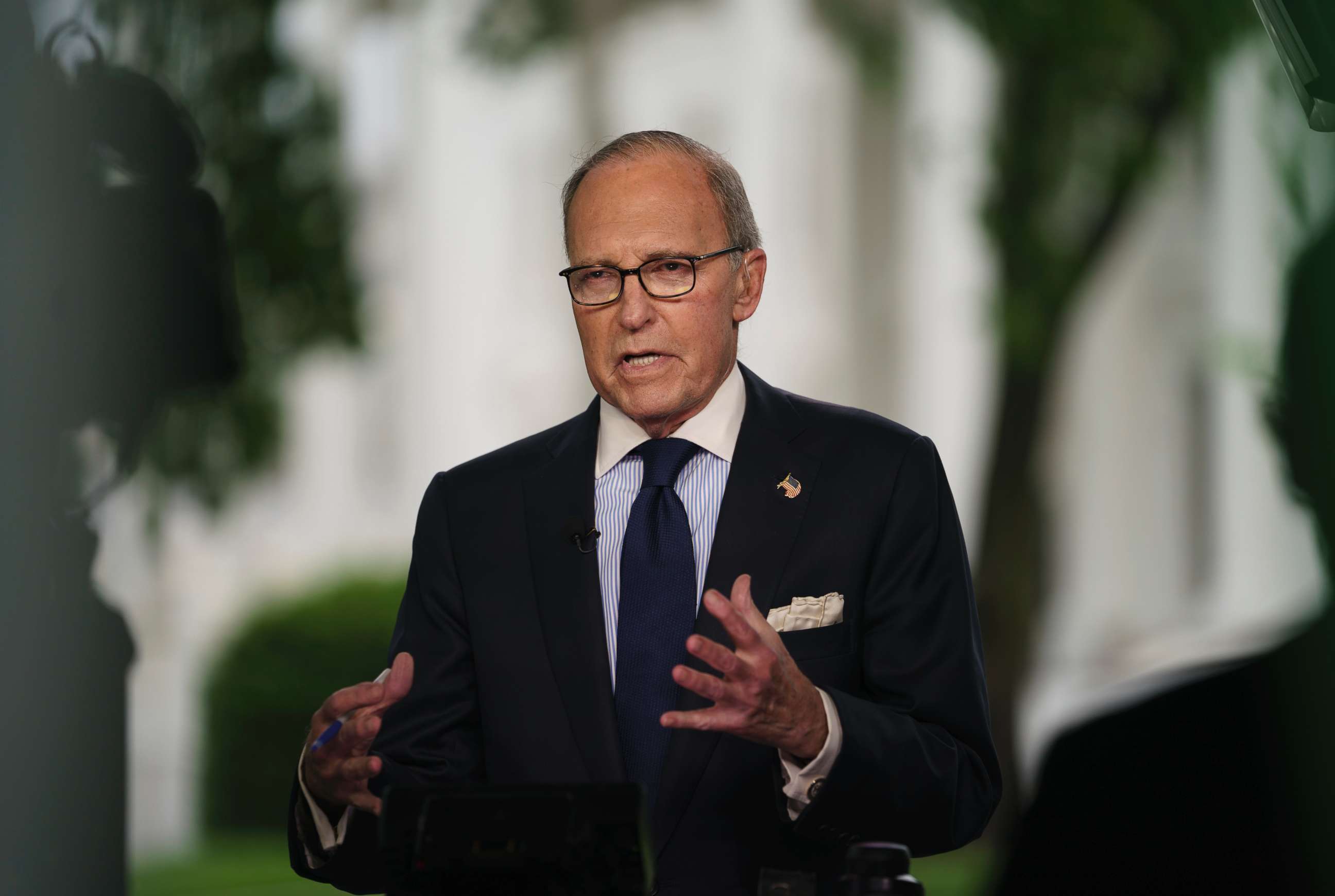 PHOTO: White House chief economic adviser Larry Kudlow speaks during a television interview outside the West Wing of the White House on May 18, 2018.