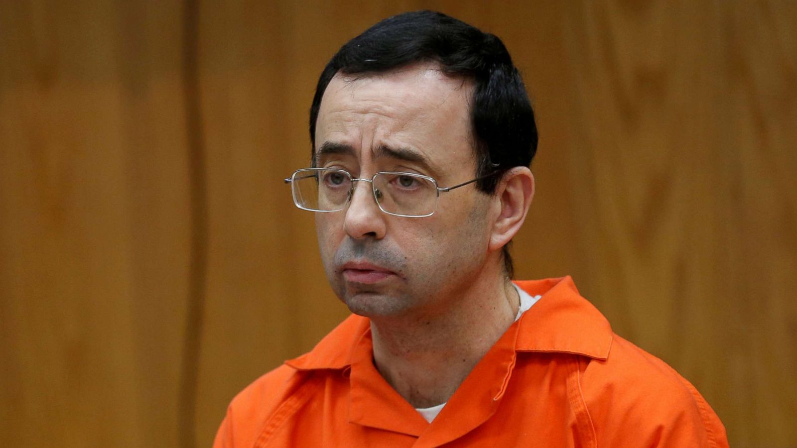 PHOTO: Larry Nassar, a former team USA Gymnastics doctor who pleaded guilty in November 2017 to sexual assault, listens to victims impact statements during his sentencing in the Eaton County Circuit Court in Charlotte, Mich., Jan. 31, 2018.