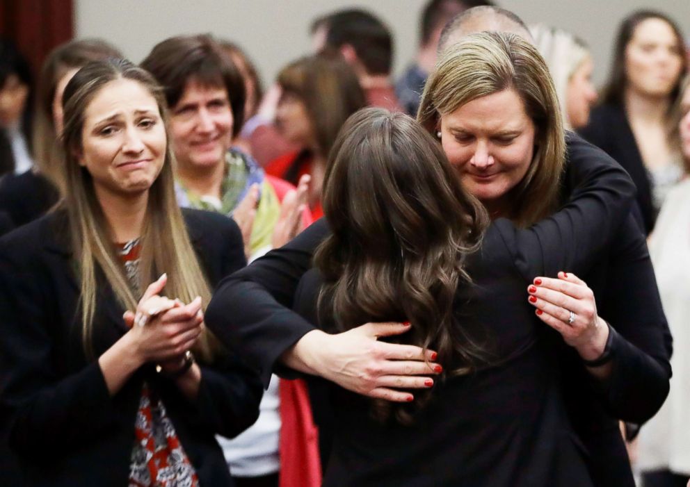 PHOTO: Victims react and hug Assistant Attorney General Angela Povilaitis after Larry Nassar was sentenced by Judge Rosemarie Aquilina to 40 to 175 years in prison, during a sentencing hearing on Jan. 24, 2018, in Lansing, Mich. 