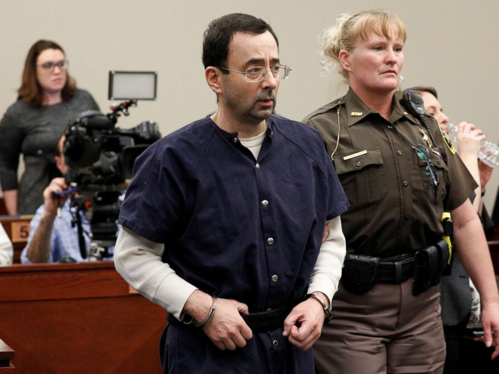 PHOTO: Larry Nassar, a former team USA Gymnastics doctor, who pleaded guilty in Nov. 2017 to sexual assault charges, is led from the courtroom after listening to victim testimony during his sentencing hearing in Lansing, Mich., Jan. 23, 2018.