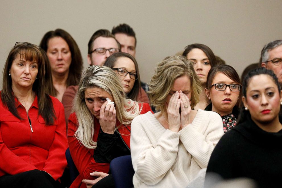 PHOTO: Victims and others look on as Rachael Denhollander speaks at the sentencing hearing for Larry Nassar in Lansing, Mich., on Jan. 24, 2018. 