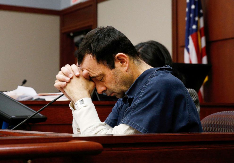 PHOTO: Dr. Larry Nassar, a former team USA Gymnastics doctor who pleaded guilty in November 2017 to sexual assault charges, listens to a victim during his sentencing hearing in Lansing, Michigan, Jan. 16, 2018. 