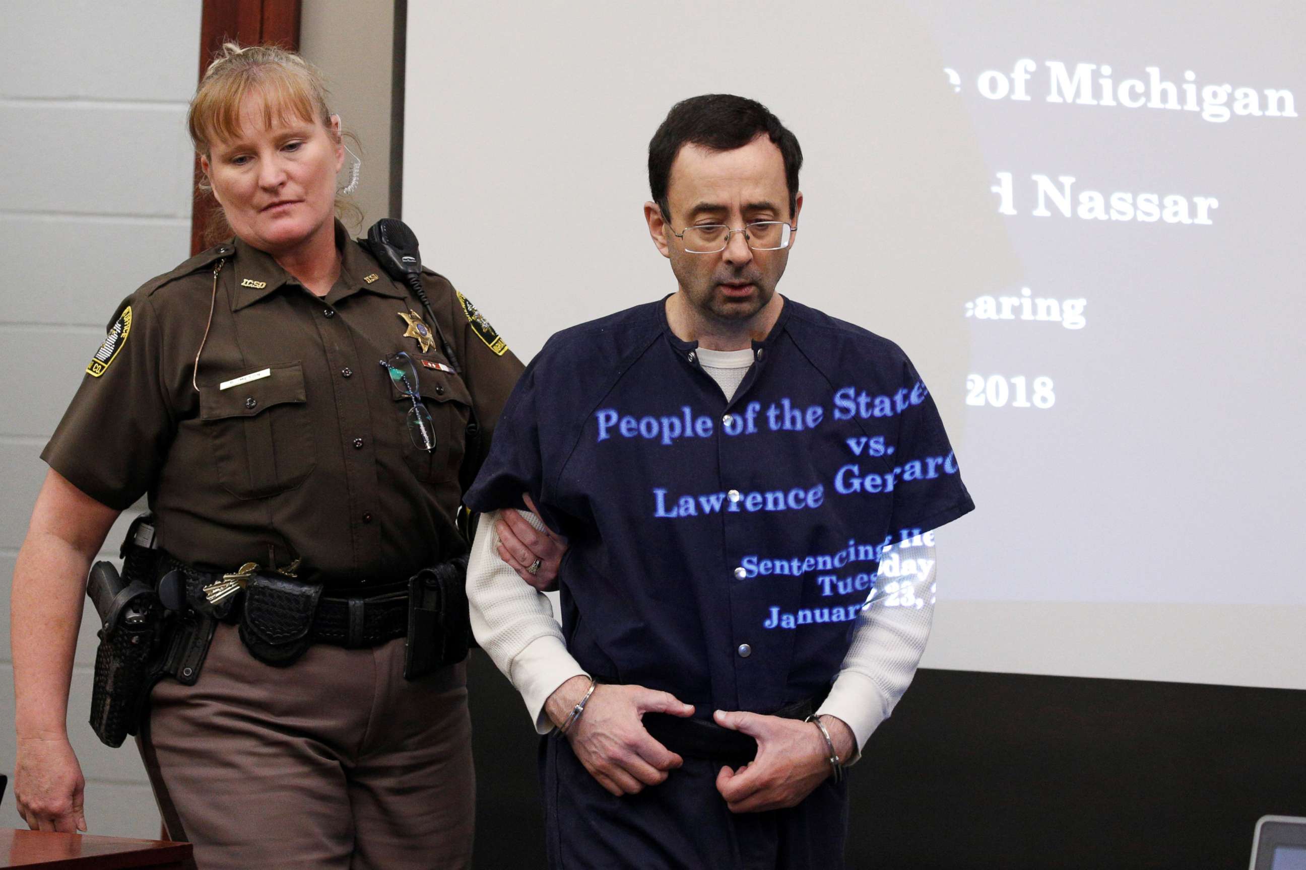 PHOTO: Larry Nassar, a former team USA Gymnastics doctor, who pleaded guilty in November 2017 to sexual assault charges, returns from a break to listen to victim testimony in the courtroom during his sentencing hearing in Lansing, Mich., Jan. 23, 2018.