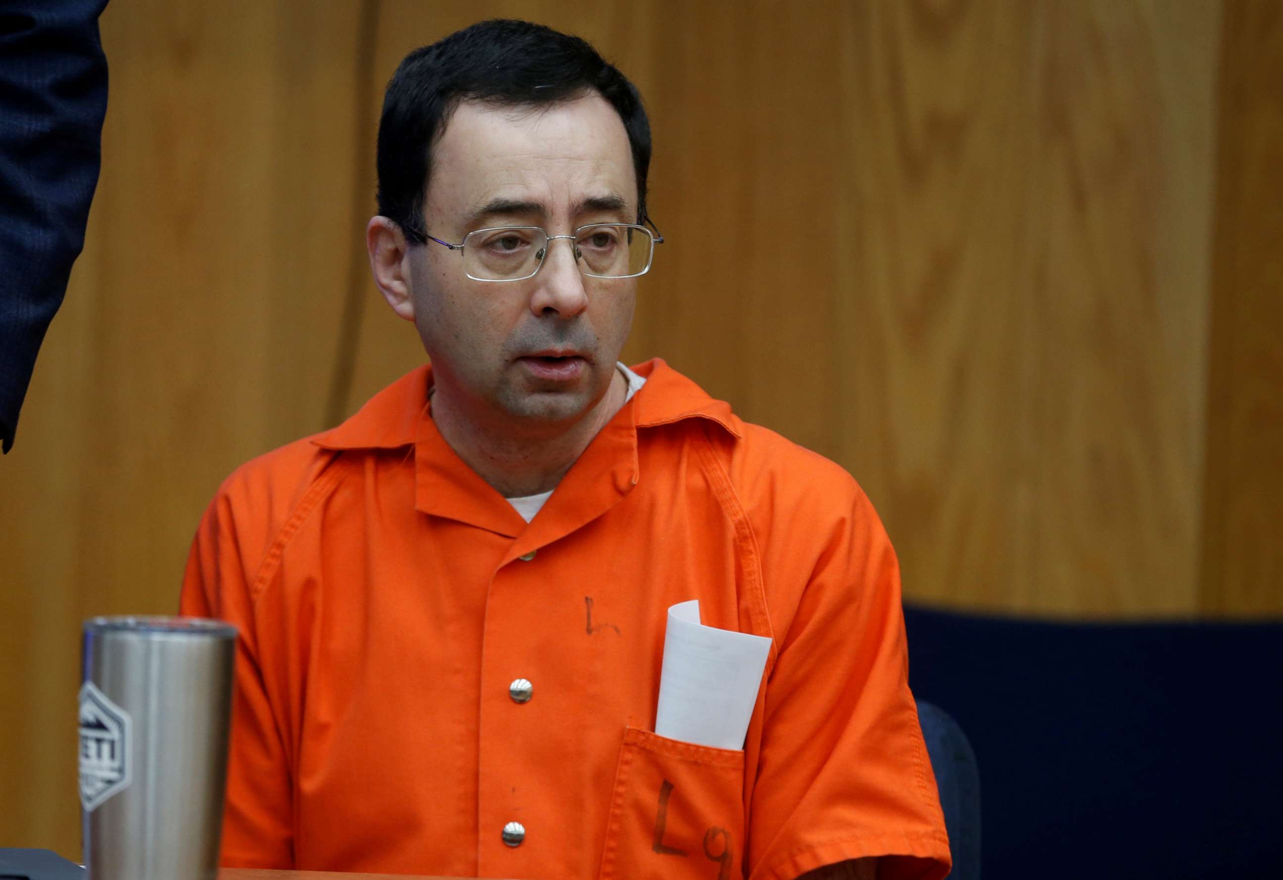 PHOTO: Larry Nassar sits in the court room during victim statements of his second sentencing in the Eaton County Circuit Court in Charlotte, Michigan, Jan. 31, 2018.  