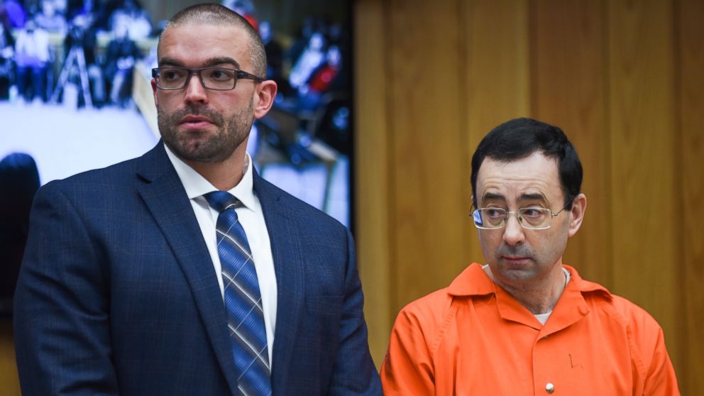 Larry Nassar appears in Judge Janice Cunningham's courtroom with his attorney Matt Newburg during the first day of victim impact statements in Eaton County Circuit Court, Jan. 31, 2018 in Charlotte, Michigan. 