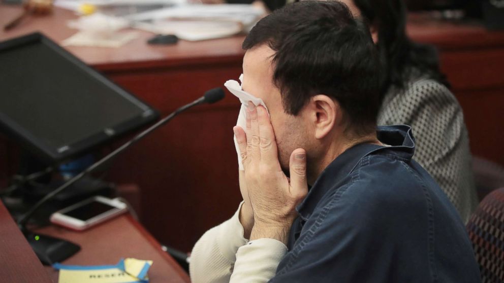 Larry Nassar listens to victim impact statements prior to being sentenced, Jan. 16, 2018, in Lansing, Mich.