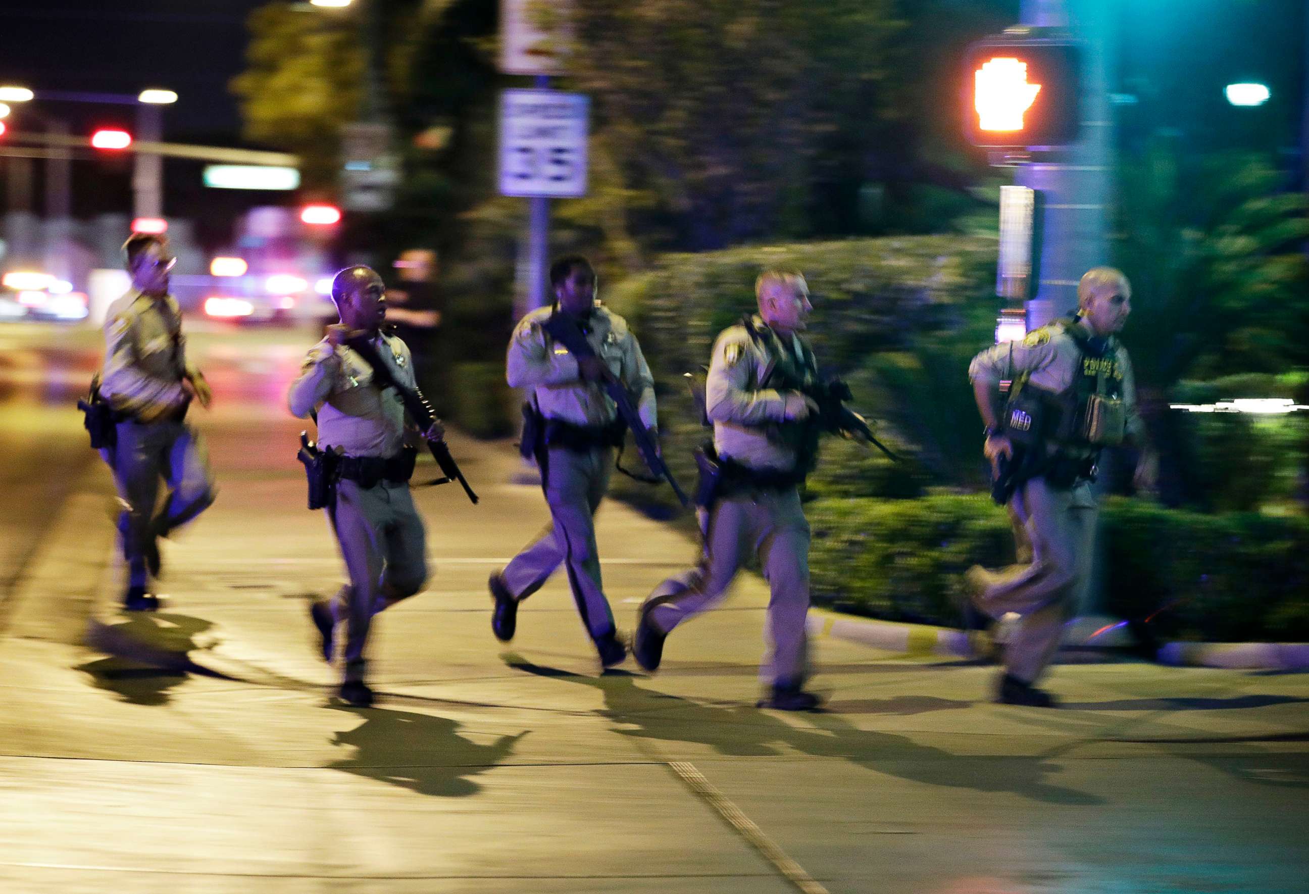 PHOTO: Police run at the scene of a shooting near the Mandalay Bay resort and casino on the Las Vegas Strip, Oct. 1, 2017, in Las Vegas. 