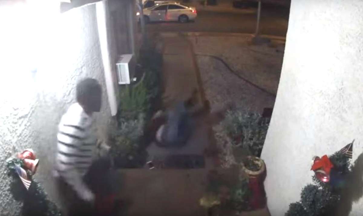 PHOTO: In this still image from a video captured by a doorbell camera outside a home in Las Vegas, an unidentified woman is seen falling on her back after being kicked down the stairs by an unidentified man, Jan. 1, 2020.