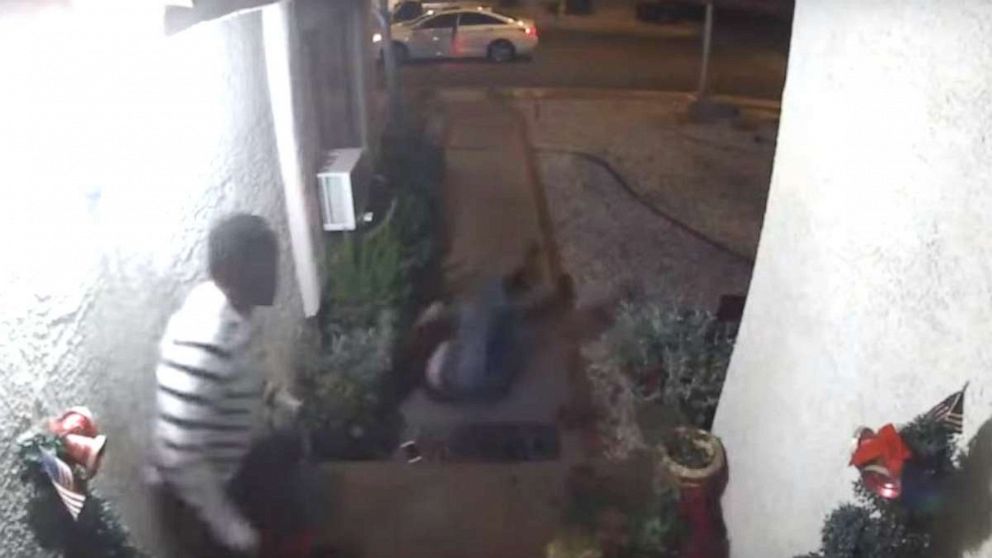 PHOTO: In this still image from a video captured by a doorbell camera outside a home in Las Vegas, an unidentified woman is seen falling on her back after being kicked down the stairs by an unidentified man, Jan. 1, 2020.