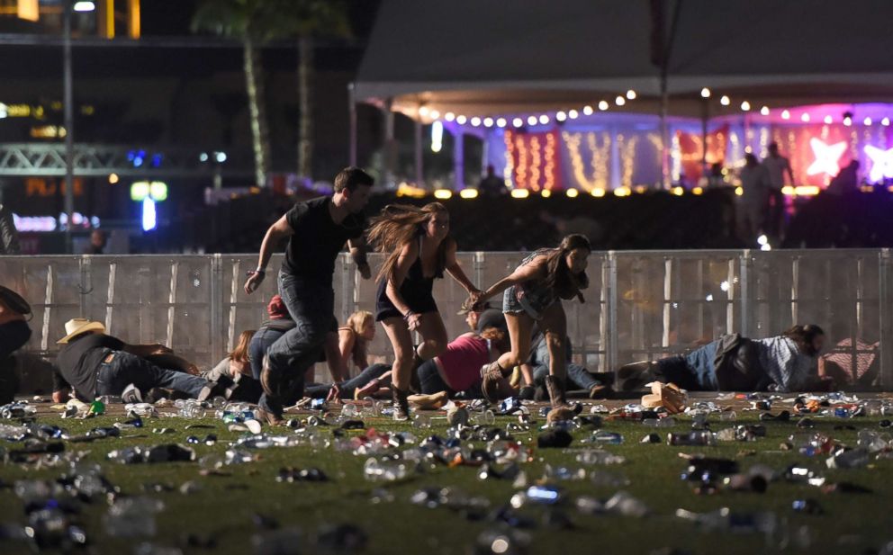 PHOTO: People run from the Route 91 Harvest country music festival after gun fire was heard on Oct. 1, 2017, in Las Vegas.