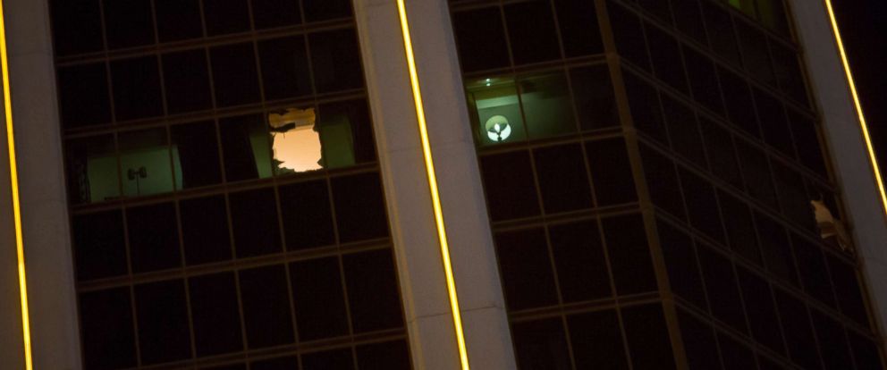 Portrait Emerging Of Las Vegas Shooter As Man Descending Into Photo Broken Windows Are Visible In A 32nd Floor Suite At The Mandalay Bay