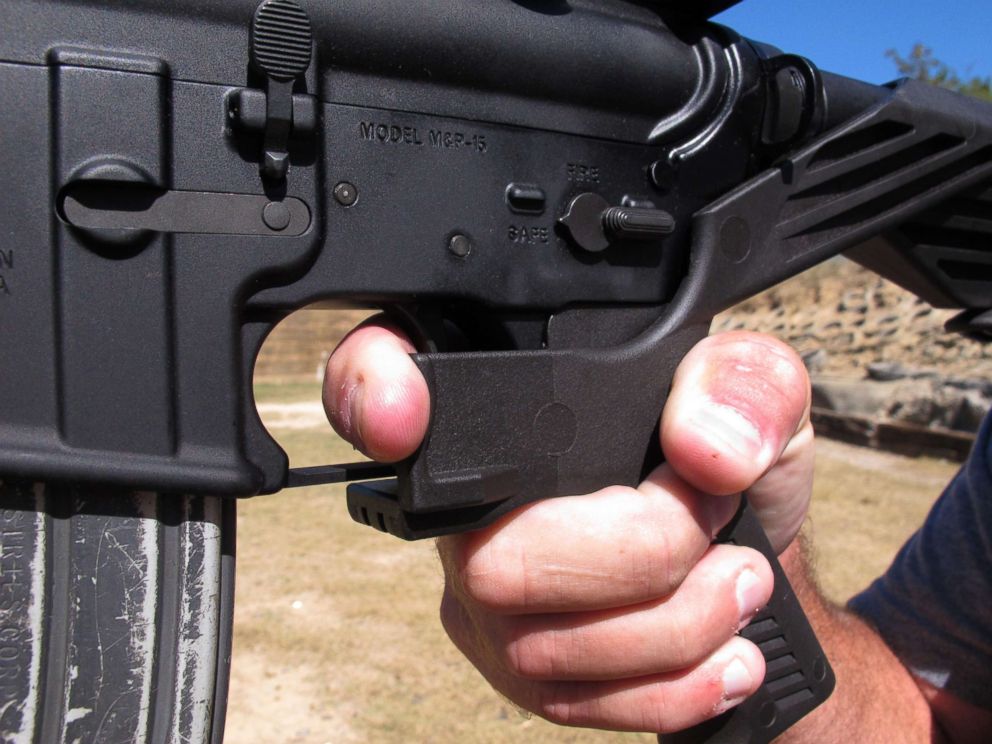 PHOTO: Shooting instructor Frankie McRae illustrates the grip on an AR-15 rifle fitted with a "bump stock" at his 37 PSR Gun Club in Bunnlevel, N.C., Oct. 4, 2017.