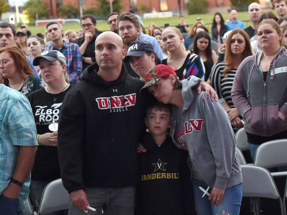 PHOTO: People gather during a candlelight vigil for victims of the Las Vegas shooting at Ascend Amphitheater, Oct. 2, 2017, in Nashville, Tenn.