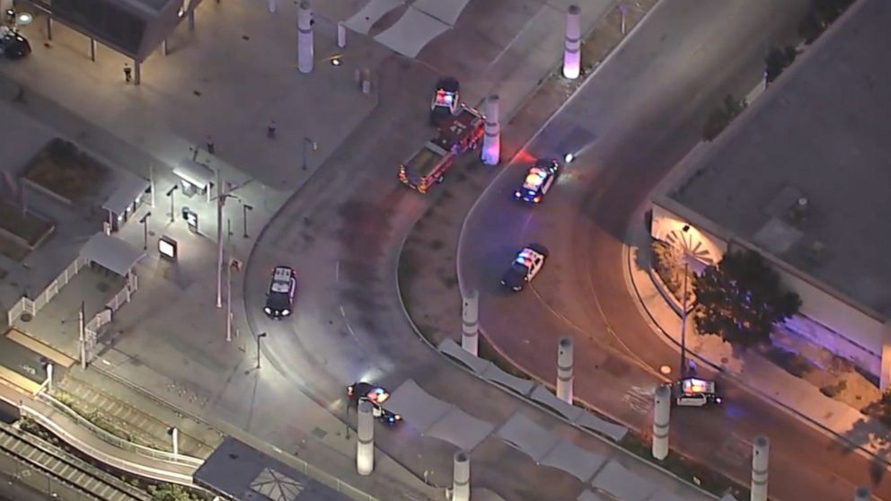 PHOTO: Law enforcement swarms the Metro station in Compton where two Los Angeles sheriff's deputies were shot in an ambush on Saturday, Sept. 12, 2020.