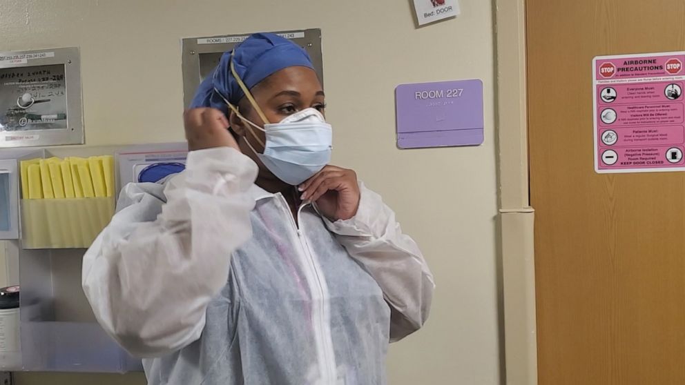 PHOTO: Latisha Knight works in environmental services in this hospital - cleaning and sanitizing patient rooms.