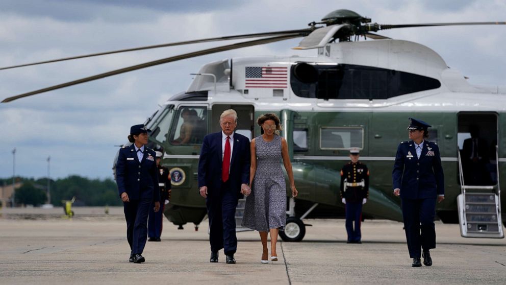 PHOTO: President Donald Trump and first lady Melania Trump walk off Marine One to board Air Force One for a trip to attend the SpaceX Demonstration Mission 2 Launch at Kennedy Space Center, May 27, 2020, in Andrews Air Force Base, Md.