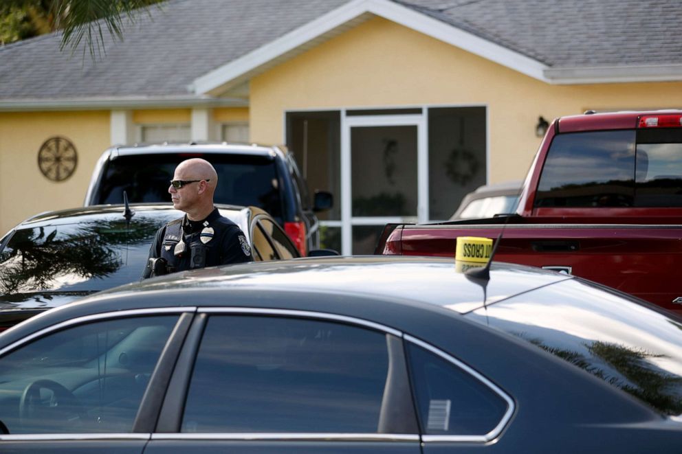 PHOTO: A police officer stands outside the home of Brian Laundrie on Sept 20, 2021 in North Port, Fla.