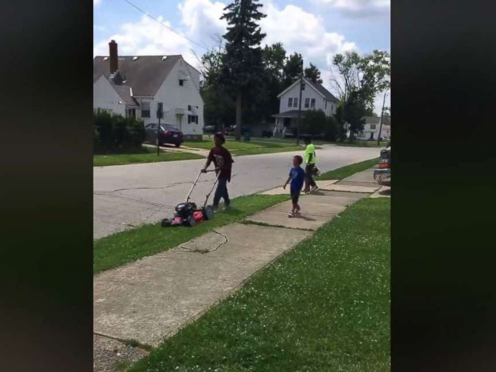   PHOTO: Reginald Fields received a new lawn mower and a new leaf thrower from the community after neighbors called the police to cut grass. 