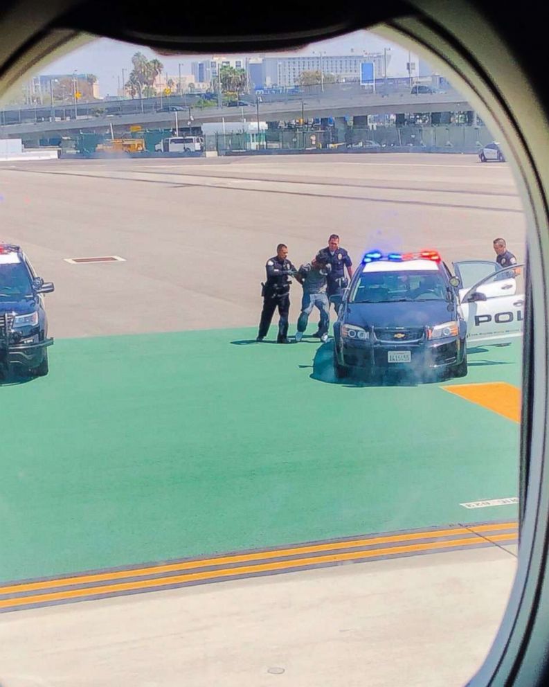 A person who ran onto the runway at Los Angeles International Airport on Monday, Aug. 27, was apprehended by police.