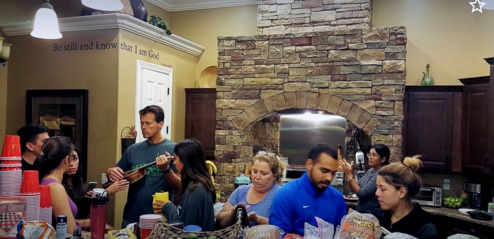 PHOTO: Hurricane Irma evacuees eat a meal together during their time staying at Leah and Dan Bolton's Tennessee house.